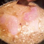 halibut cooking in pan
